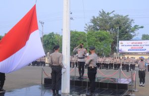 Kapolres Metro Tetap Khidmat Ikuti Upacara Haornas di Tengah Paparan Abu Vulkanik
